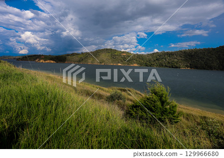 View of the biggest artificial lake in Colombia called Calima Lake located on the mountains of Darien at the region of Valle del Cauca View of the biggest artificial lake in Colombia called Calima Lake located on the mountains of Darien at the region of Valle del Cauca 129966680