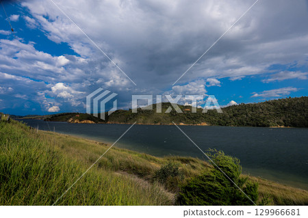 View of the biggest artificial lake in Colombia called Calima Lake located on the mountains of Darien at the region of Valle del Cauca View of the biggest artificial lake in Colombia called Calima Lake located on the mountains of Darien at the region of Valle del Cauca 129966681