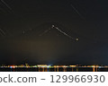 The light trails of climbers and stars at the sunrise on Mount Fuji 129966930