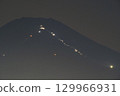 Mount Fuji sunrise climbers' trail of light 129966931