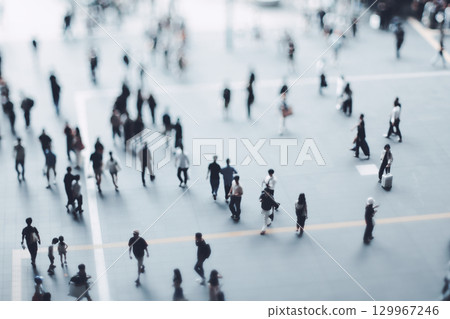Miniature people walking around Osaka Station 129967246