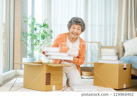Senior cardboard end-of-life planning 129968402