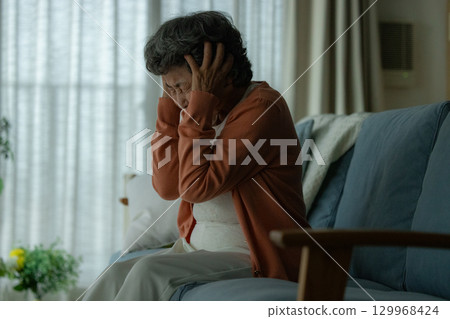 depressed elderly woman 129968424