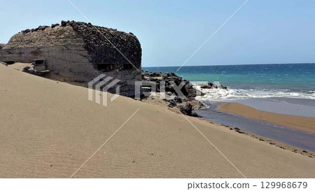 A Historical Coastal Fortress Standing Strong by the Gorgeous Ocean and Its Waves 129968679