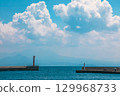 A harbor covered in summer clouds 129968733
