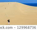 People walking in the Tottori Sand Dunes 129968736