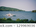A ship sailing on the sea as seen from Ama Town 129969036