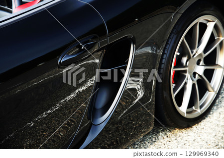 Shiny black sports car side intake 129969340