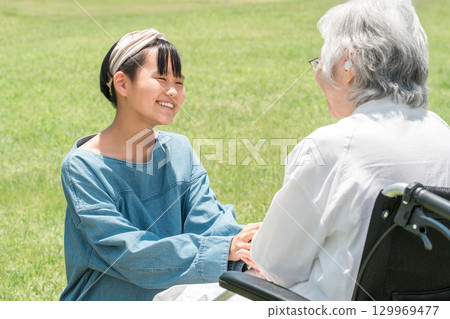 Elderly people, senior women, grandchildren interacting with grandmother, daughter, children 129969477