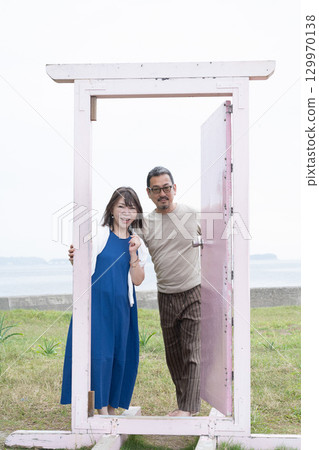A couple passing through the Anywhere Door on Himaka Island A couple passing through the Anywhere Door on Himaka Island 129970138