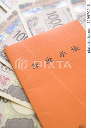 Pension book and banknotes Pension book and banknotes 129970948