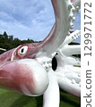 A close-up of the mouth of the squid mall monument 129971772