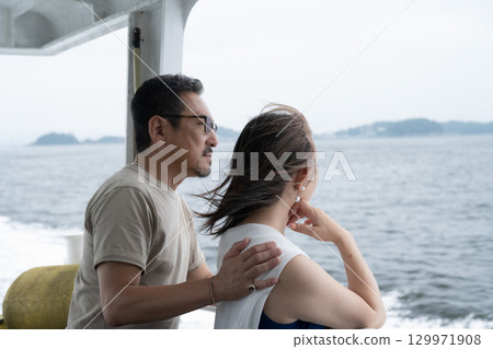 A middle-aged couple on a boat trip, Himaka Island, Minamichita, Aichi Prefecture 129971908