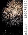 Fireworks blooming in the night sky 129972429