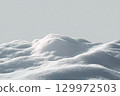 Beautiful snowdrift isolated on white background. Winter snow background. A big snow drift 129972503