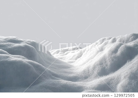 Beautiful snowdrift isolated on white background. Winter snow background. A big snow drift 129972505