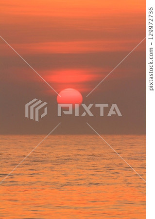Morning beach and sunrise Morning beach and sunrise 129972736