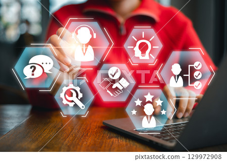 A professional IT expert interacts with a digital interface, showcasing technology and innovation concepts. 129972908