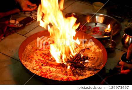 Sacred Fire Ritual in Hindu Puja Ceremony Sacred Fire Ritual in Hindu Puja Ceremony 129973497