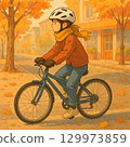 A girl riding a bicycle 129973859