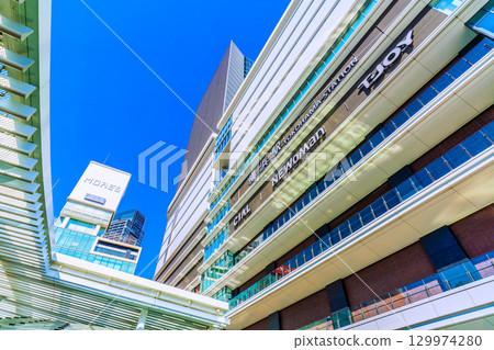 Yokohama cityscape, Japan, on August 23. View of Yokohama Station, JR Yokohama Tower, The Yokohama Front Tower, and more. 129974280