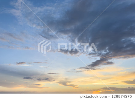 Dramatic sundown cloudy background 129974570
