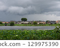 The season when the lotus festival begins. Scenery on the banks of Shironuma Pond between rain showers. 129975390
