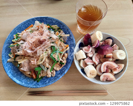 Yakiudon, fried udon noodles An example of fried udon noodles, set with summer dessert 129975862