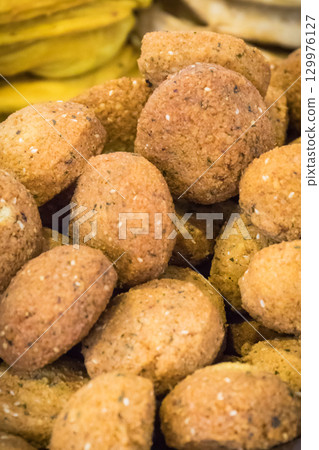 Aromatic falafel balls with chickpeas and vegetables. Vegetarian dish Aromatic falafel balls with chickpeas and vegetables. Vegetarian dish 129976127