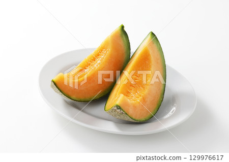 White background and red flesh melon from Furano, Hokkaido 129976617