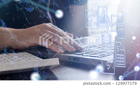 Digital finance analytics with woman using laptop 129977179