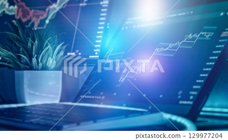 bullish trading chart on a tablet with glowing highlights, symbolizing financial growth, analysis, and optimism. 129977204