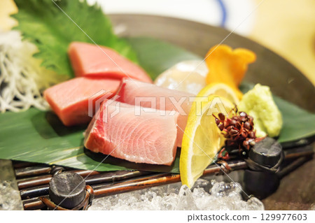 Fresh and delicious sashimi platter Fresh and delicious sashimi platter 129977603