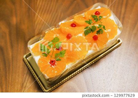 A seasonal cake made with mandarin oranges 129977629