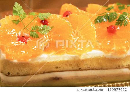 A seasonal cake made with mandarin oranges 129977632