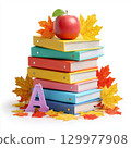 Colorful stack of binders with red apple and autumn leaves on a white background 129977908