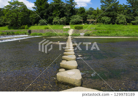 Kyoto: Kamo River and Kitayama Stepping Stones near Kyoto Botanical Gardens 129978189