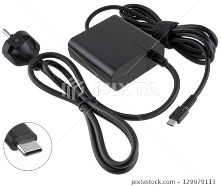 Laptop power adapter, black, on a white background in isolation 129979113