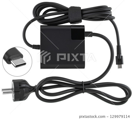 Laptop power adapter, black, on a white background in isolation Laptop power adapter, black, on a white background in isolation 129979114