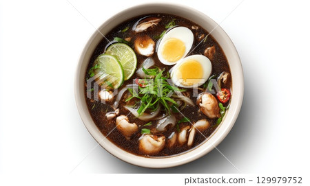 Delicious pho soup with beef, shrimp, rice noodles and chopsticks in bowl 129979752