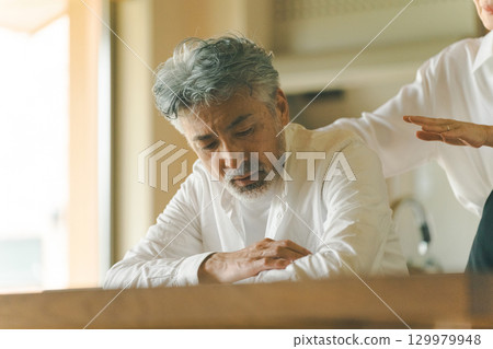 Depressed man in his 50s 129979948