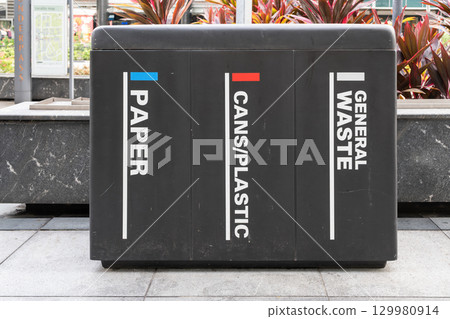 Recycling bin for paper, cans, plastic waste in Orchard Road Singapore 129980914