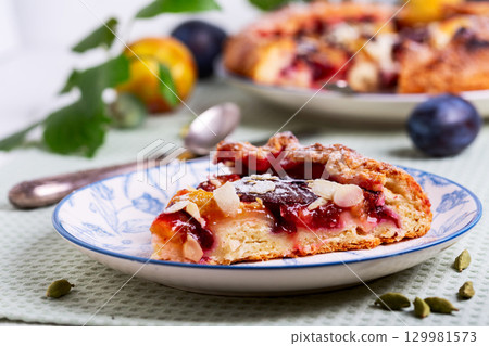 Plum-Almond Galette Slice. 129981573