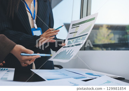 Success, audience with an applause and in a business meeting at work with a lens flare together. Achievement or celebration, motivation and businesspeople clapping hands for good news or support 129981854