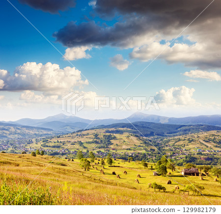 sunny mountain landscape sunny mountain landscape 129982179
