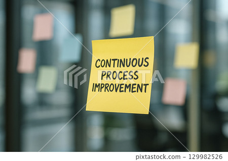 Continuous Process Improvement text with doodle style business elements such as arrows, graphs, gears. Business improvement concept Continuous Process Improvement text with doodle style business elements such as arrows, graphs, gears. Business improvement concept 129982526