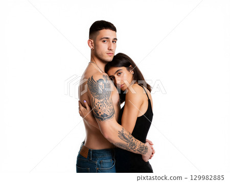 Young Couple Embracing in a Stylish Indoor Setting Showcasing Love and Affection 129982885