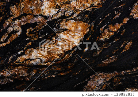 Black Magma granite texture in attractive dark color. 129982935