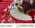 Brightly colored wind chimes and Japanese umbrellas 129982988