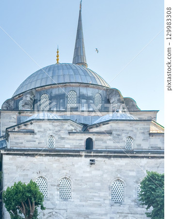 Istanbul Mosque Details: Dome and Minaret on the Sky Istanbul Mosque Details: Dome and Minaret on the Sky 129983308
